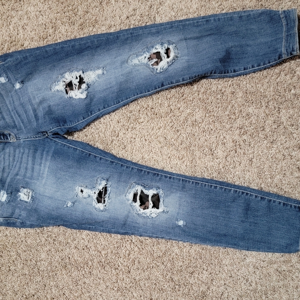 Women's Judy Blue size 15/32 distressed with camouflage inserts cuffed hem